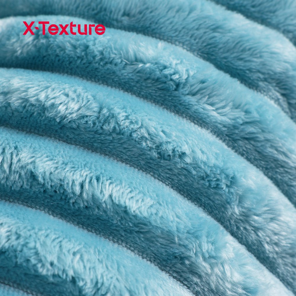 Close-up do tecido de lã coral azul-celeste com uma superfície felpuda macia.