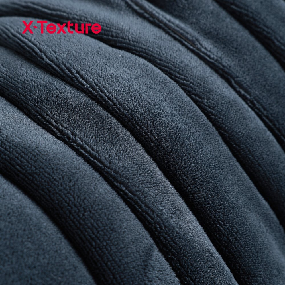 Black flannel and white sherpa fleece fabric showing the double-sided construction.