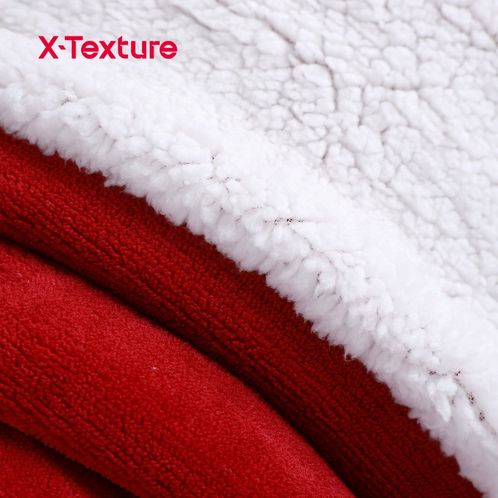 Close-up of red flannel blanket with a soft smooth surface.